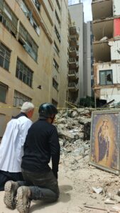 A damaged building and debris after the earthquake