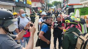 Foundation and partner teams speak near the response site