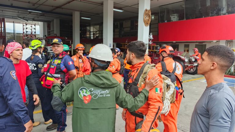 Rescue personnel meet at an operations base