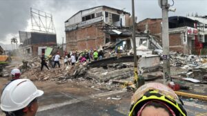 Damaged buildings and debris in the affected area