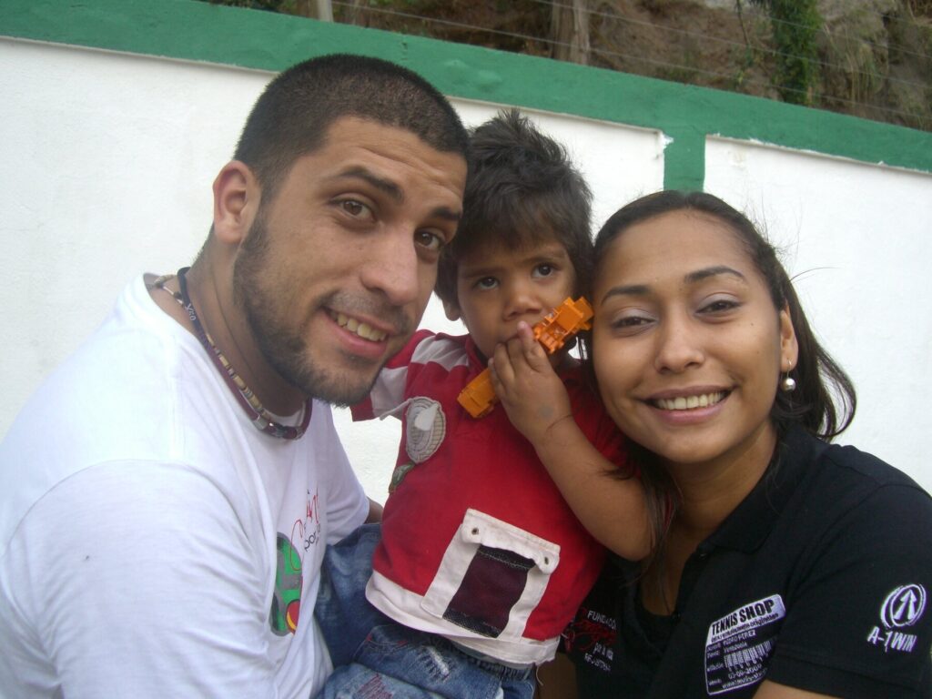 Fundación Corazones por la Vida volunteers with a child during the 2010 Hogares Bambi visit.